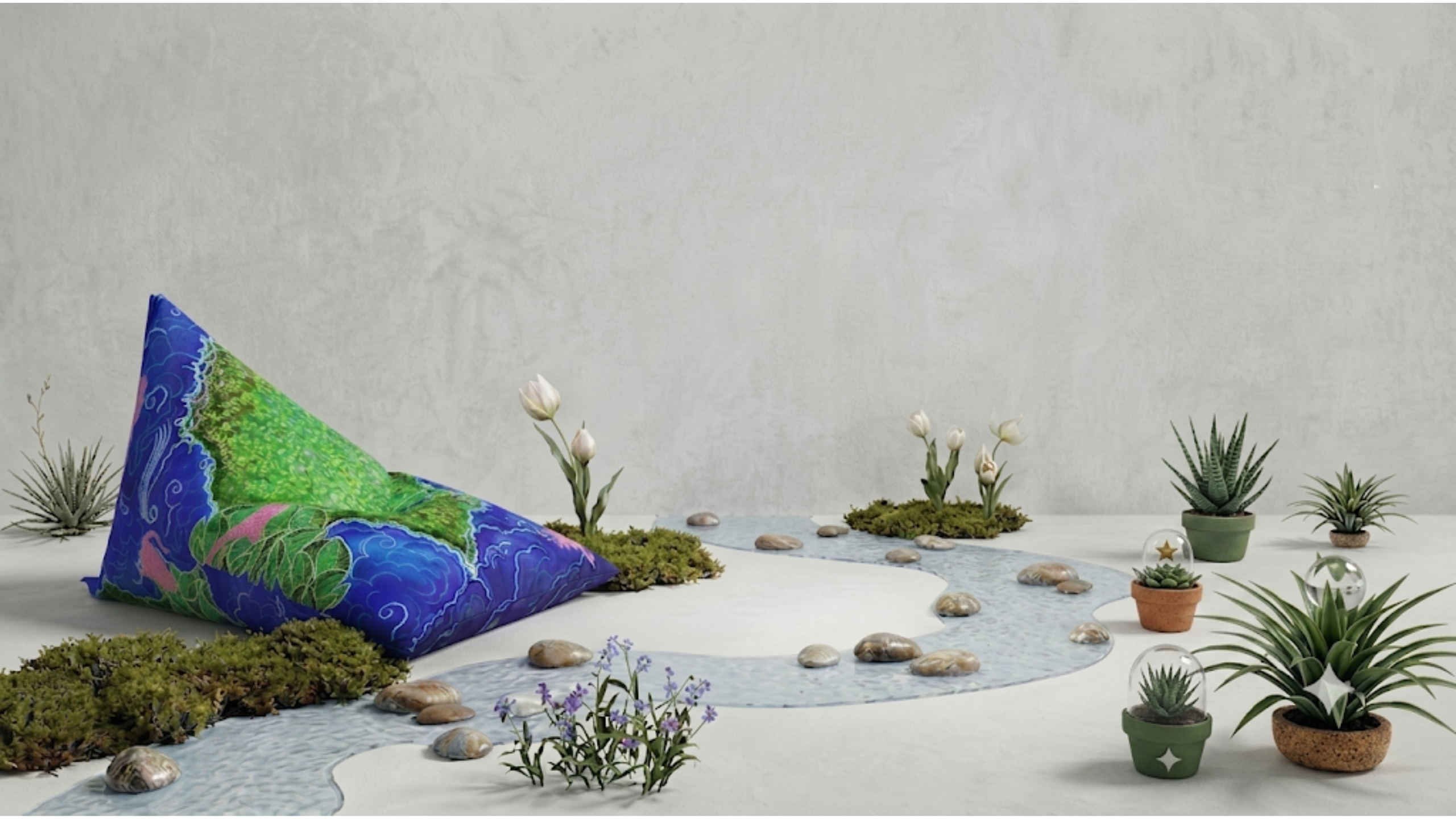 Decorative bean bag with a nature-themed design on a table with small plants and stones.